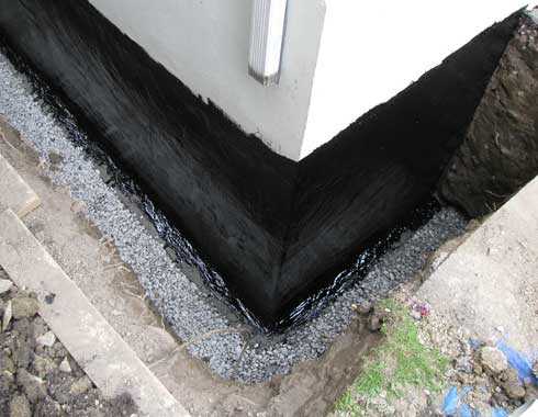 waterproofing exterior walls basement plastic tar membrane install damp waterproof weeping tile pipe away water block toronto drainage paint sealer